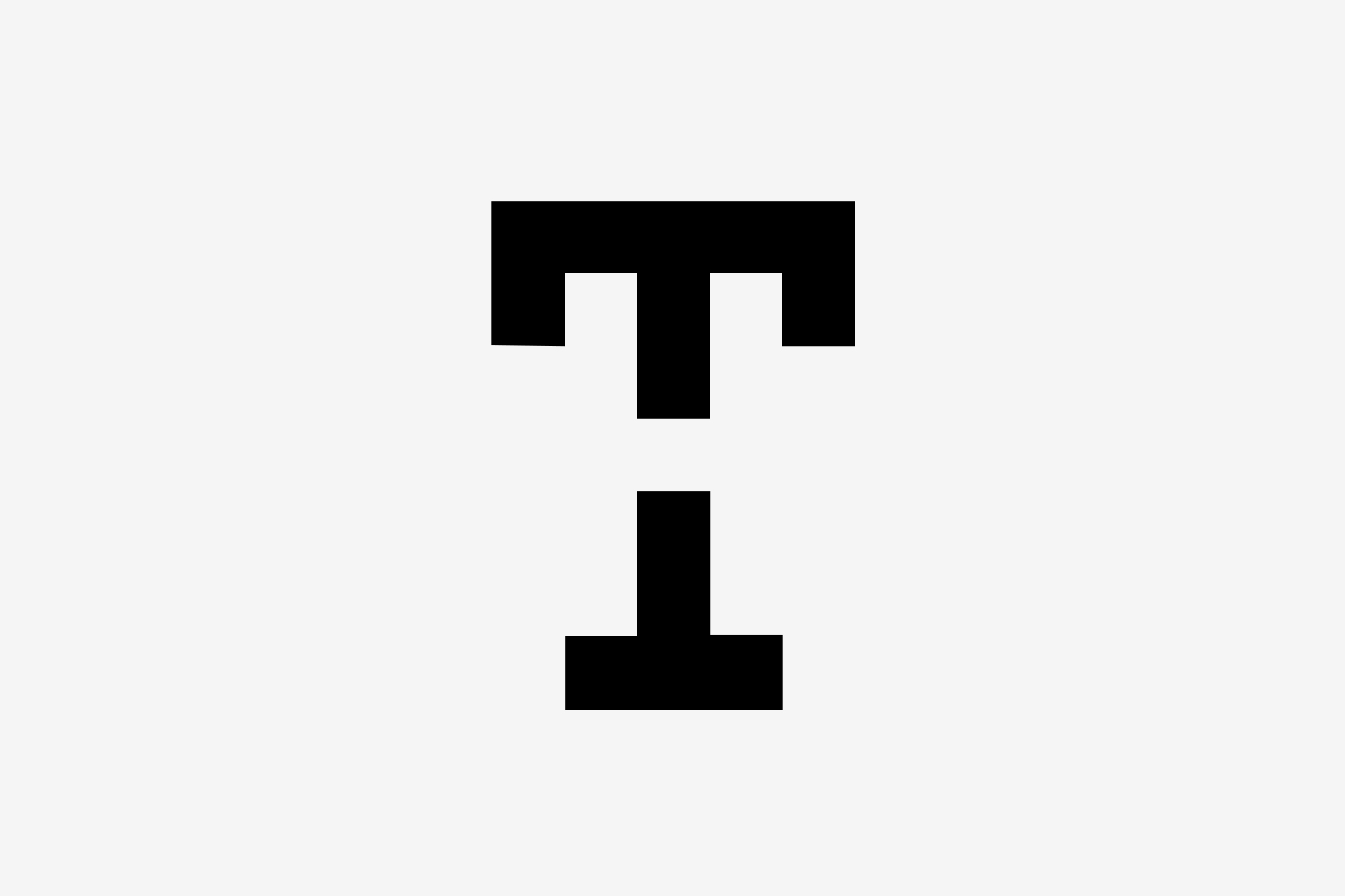 Bold geometric letter T logo with heavy vertical and horizontal strokes