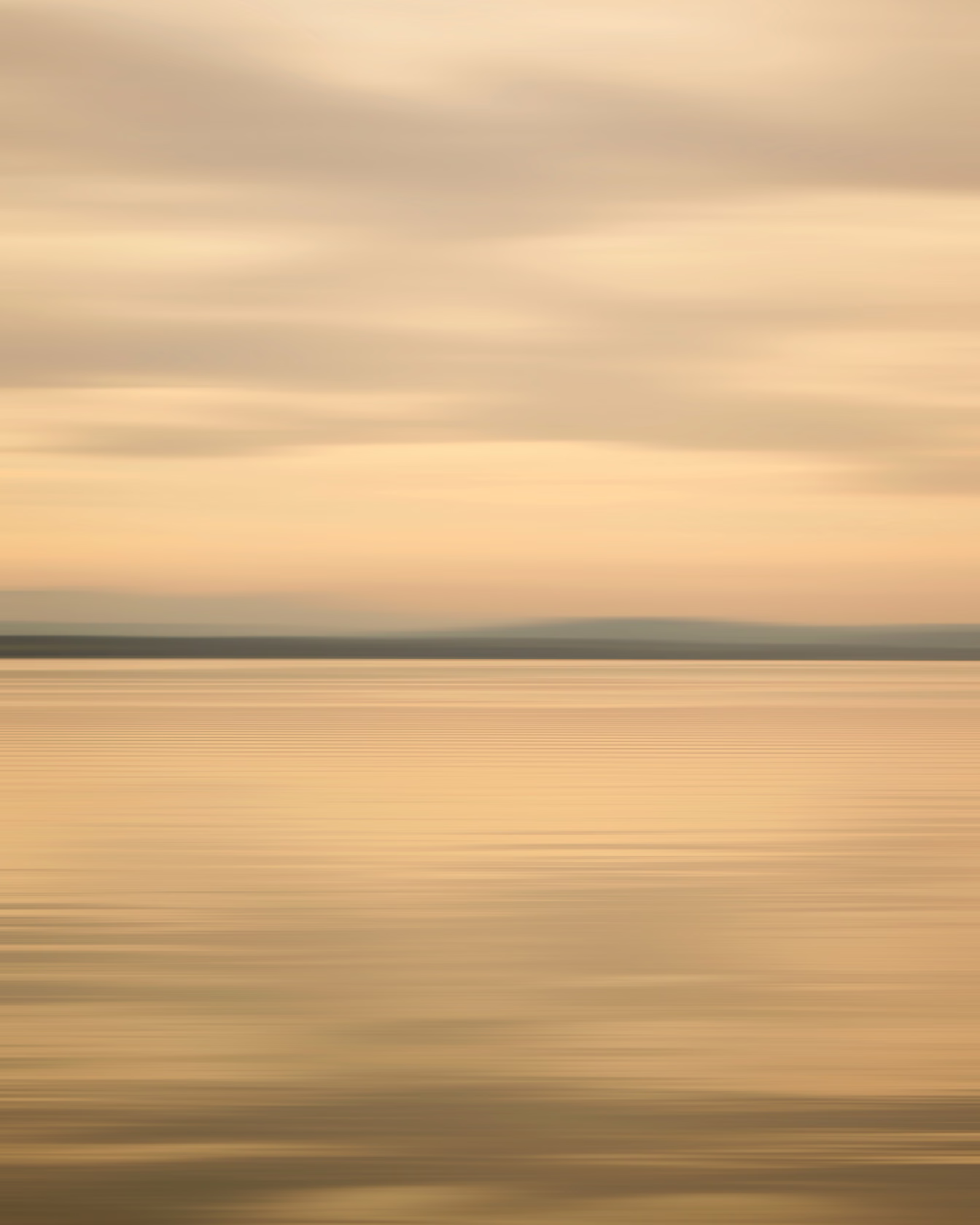 blurred landscape and horizon forming horizontal light traces