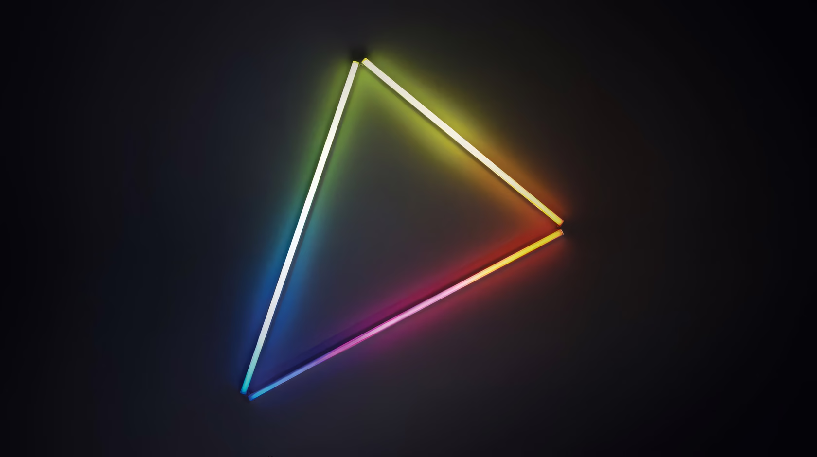 Triangular light installation with shifting rainbow color gradients