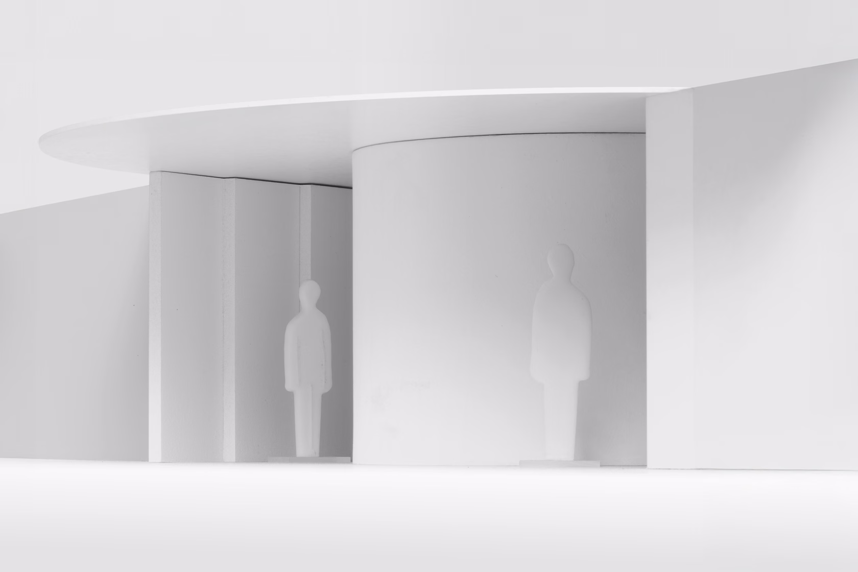 circular exhibition model with curved panels and central void