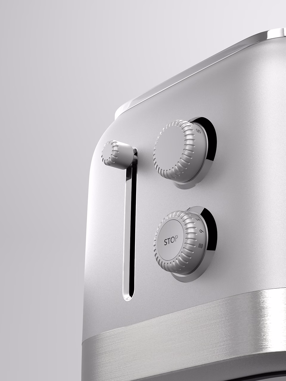 toaster controls with brushed metal finish and tactile knobs